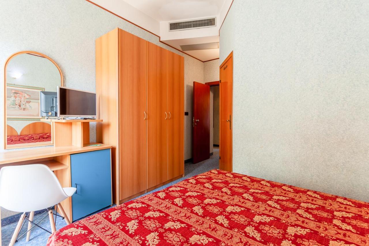 & Aparthotel