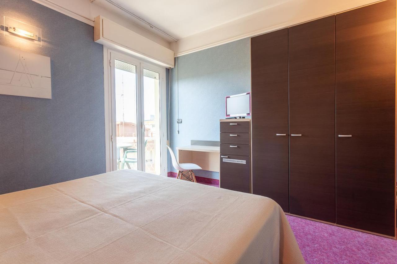 & Aparthotel